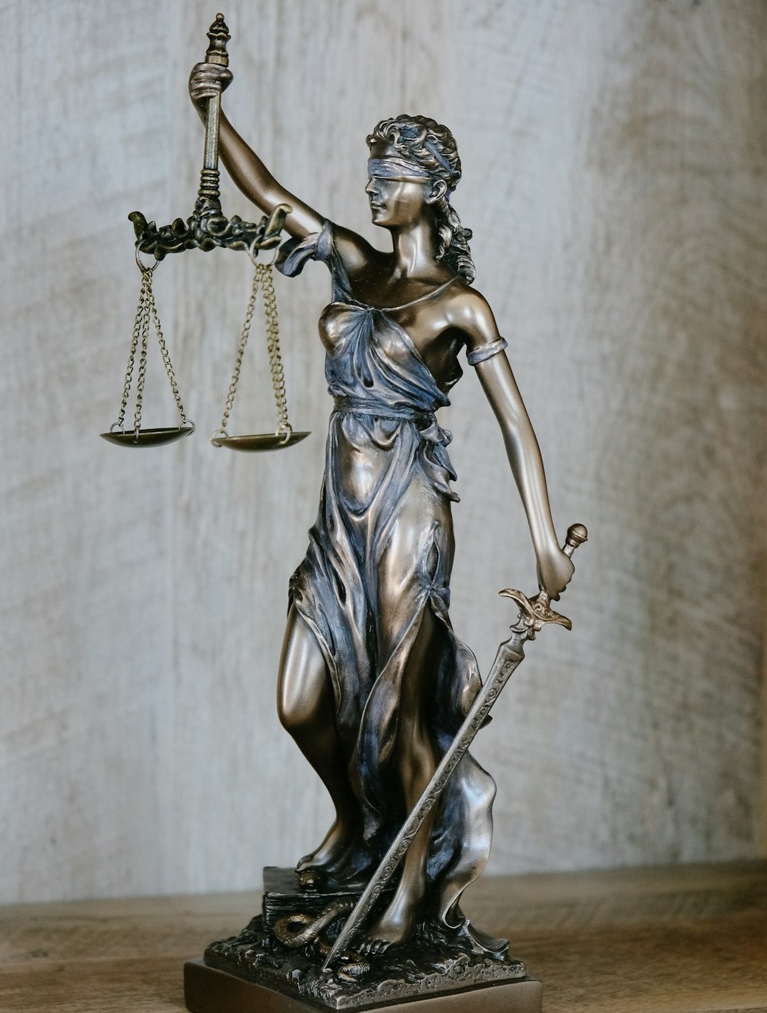 Lady Justice, an allegorical personification of the moral force in the judicial system.